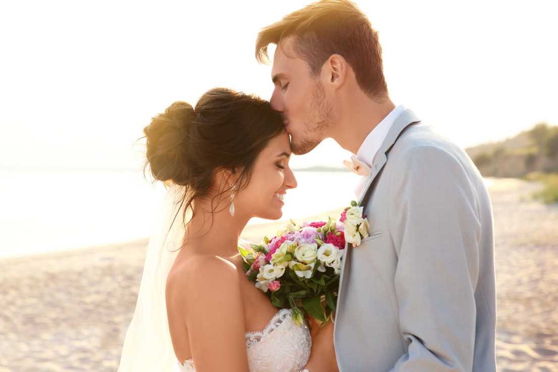 Happy Wedding Couple on Beach